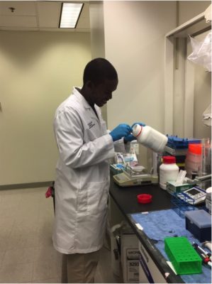 Guleid working in a lab.